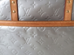 Louis Vuitton Tompkins kabelka